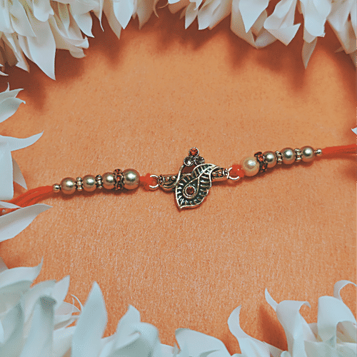 House of Festivals Leaf Pendant Rakhi - With Sparkling Stones & Pearl Beads, Multicolour, HOF-RK23-GKR-0364, 1 pc