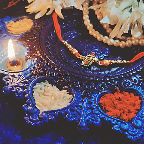 House of Festivals Leaf Pendant Rakhi - With Sparkling Stones & Pearl Beads, Multicolour, HOF-RK23-GKR-0364, 1 pc