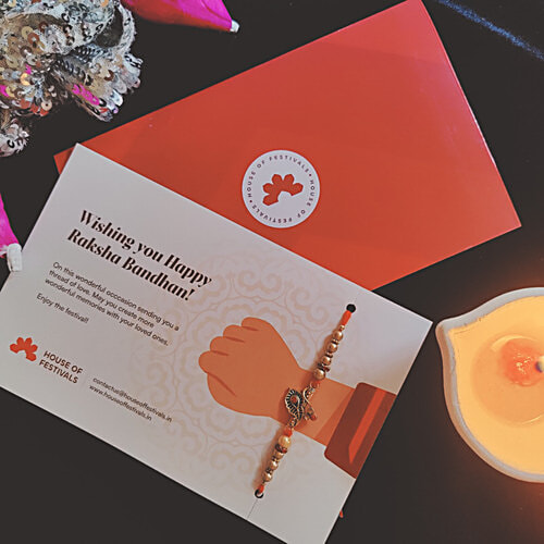 House of Festivals Leaf Pendant Rakhi - With Sparkling Stones & Pearl Beads, Multicolour, HOF-RK23-GKR-0364, 1 pc