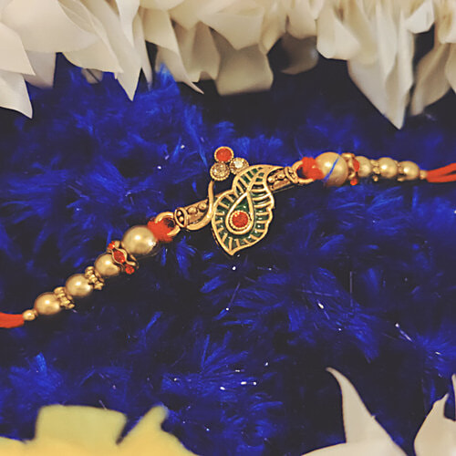 House of Festivals Leaf Pendant Rakhi - With Sparkling Stones & Pearl Beads, Multicolour, HOF-RK23-GKR-0364, 1 pc