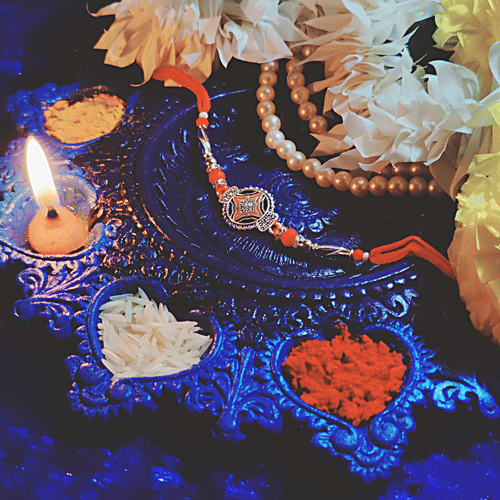 House of Festivals Silver Design Rakhi - With Red Pearl Beads, HOF-RK23-7853, 1 pc