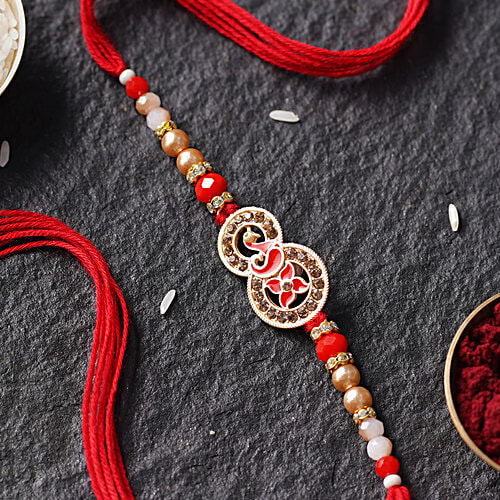 Daivya Sparsh by bigbasket Golden Red Elegance Rakhi With Kumkum & Rice, 1 pc