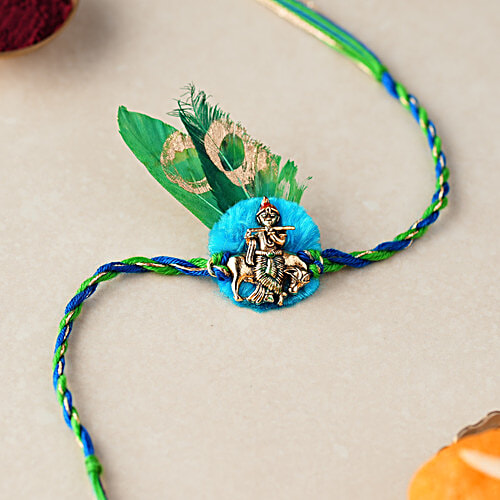 Daivya Sparsh by bigbasket Divine Feather Krishna Designer Rakhi With Kumkum & Rice, 1 pc