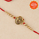 Daivya Sparsh by bigbasket Eternal Ganesha Pendant Rakhi With Kumkum & Rice 1 pc