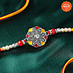 Daivya Sparsh by bigbasket Floral Radiance Pendant Rakhi With Kumkum & Rice 1 pc