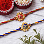 eCraftIndia Designer Rakhi Set With Roli Chawal - Red & Blue Flowers 2 pcs
