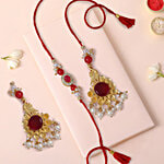 FNP Pearl Design "Bhaiya Bhabhi" Rakhi With Lumba Jewellery Rakhi - Red & Golden 2 pcs
