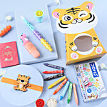 FNP Jungle Joy Kids Rakhi Hamper Set With Doms Crayons 12 pcs, Lego Pen, Dino Highlighter Stamp, Greeting Card & Roli Chawal 1 pc