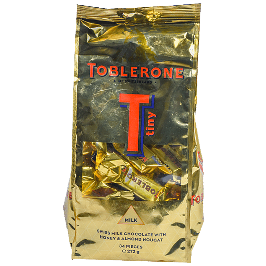 Buy Toblerone Swiss Milk Chocolate With Honey & Almond Nougat - Tiny Online  at Best Price of Rs 899 - bigbasket